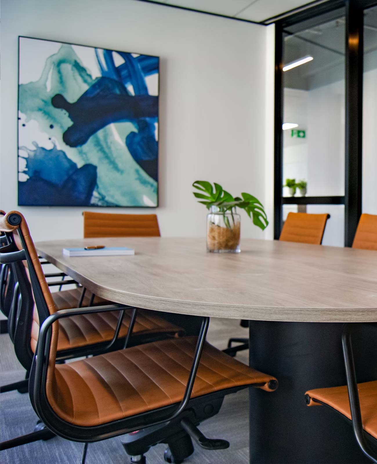 Interior of an office meeting room with a table and chairs