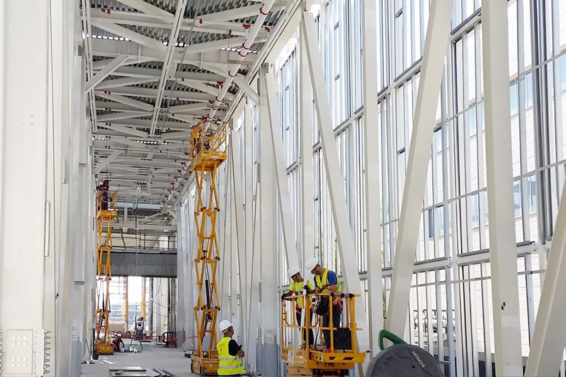 Construction of an interior office building with employees and lifts