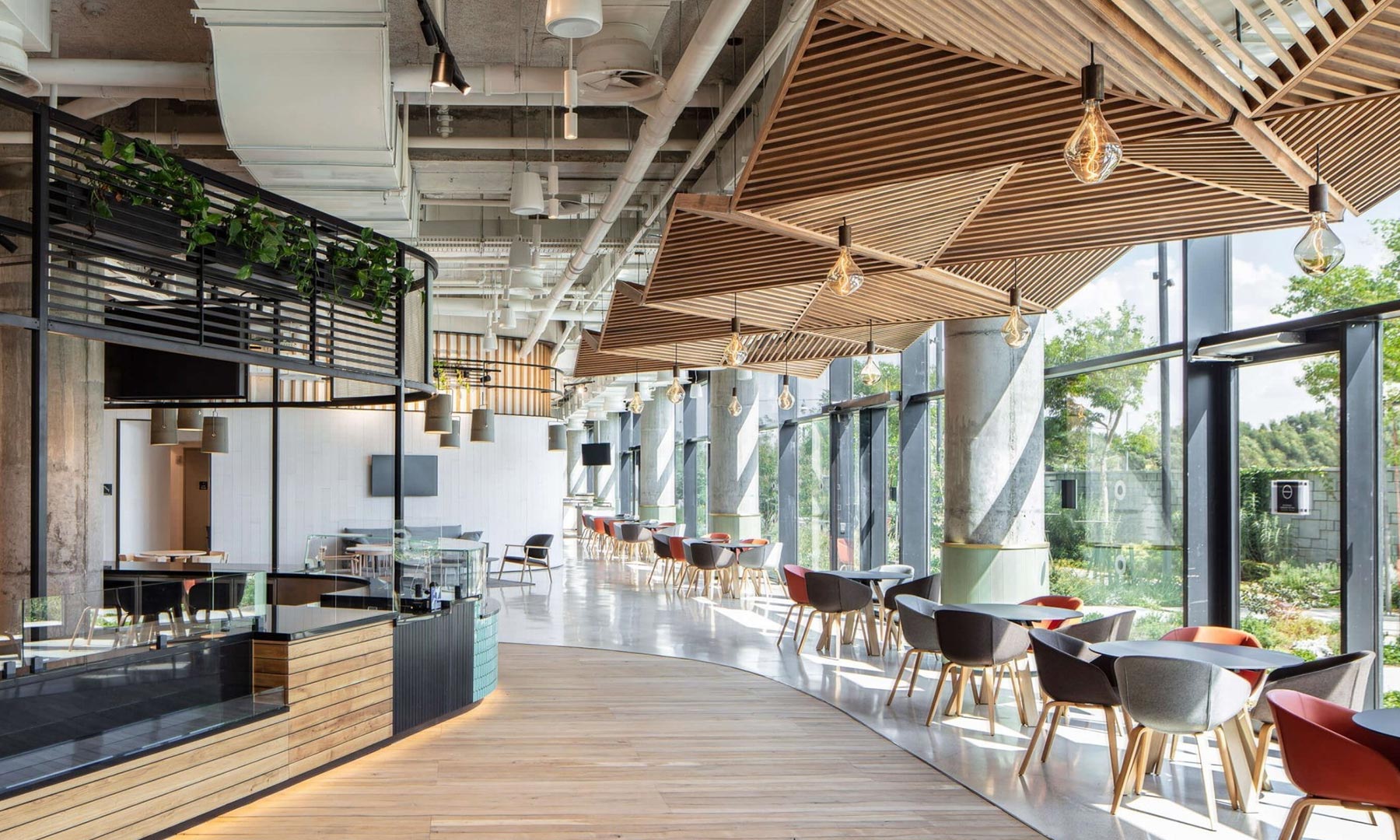 Interior of a modern cafeteria with tables and chairs